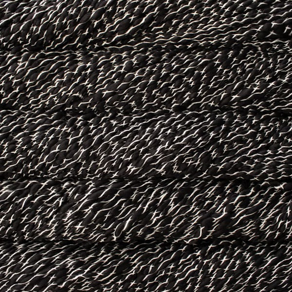 Malabrigo Caracol | Natural On Black